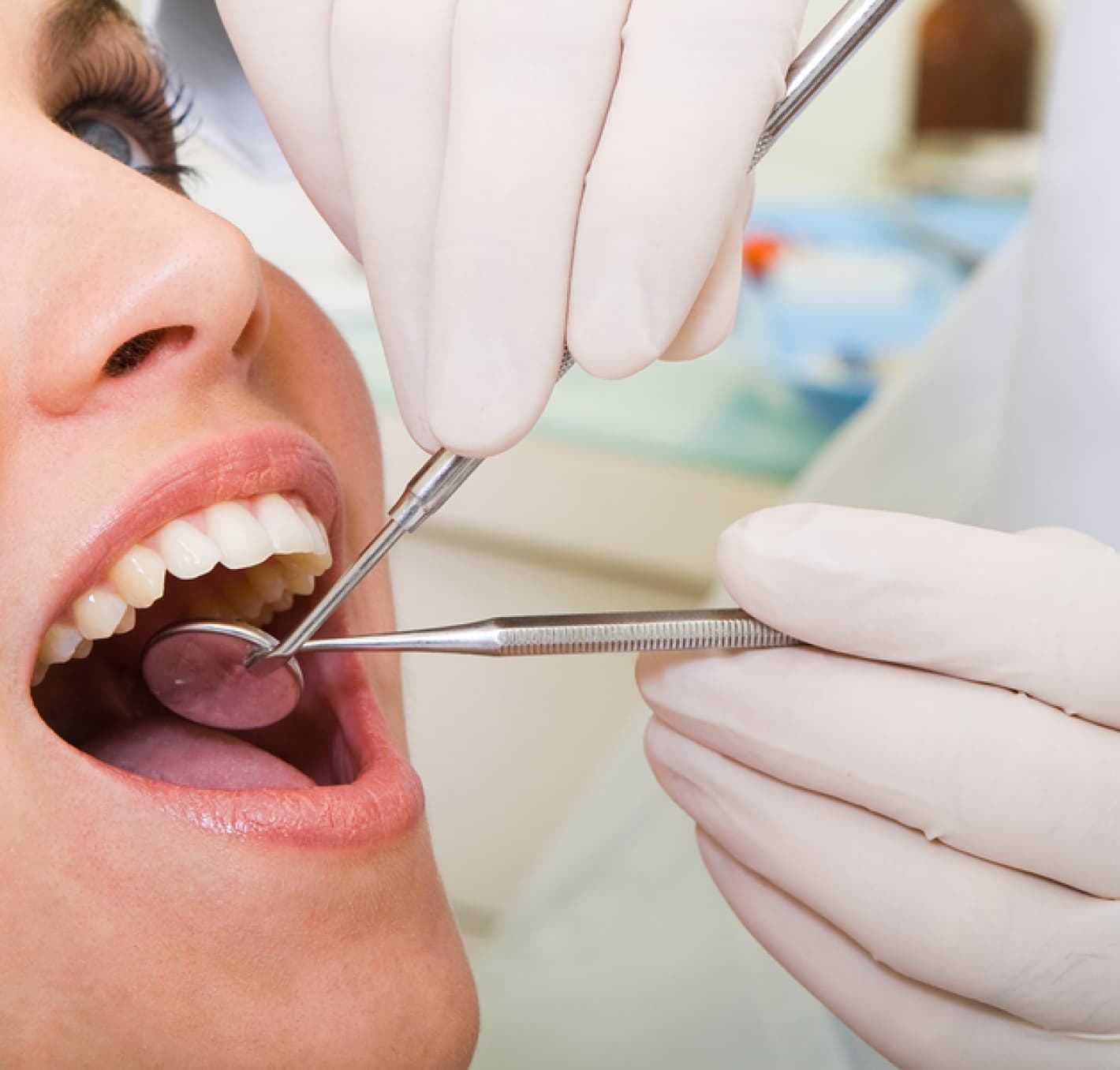 A dentist examining a patient