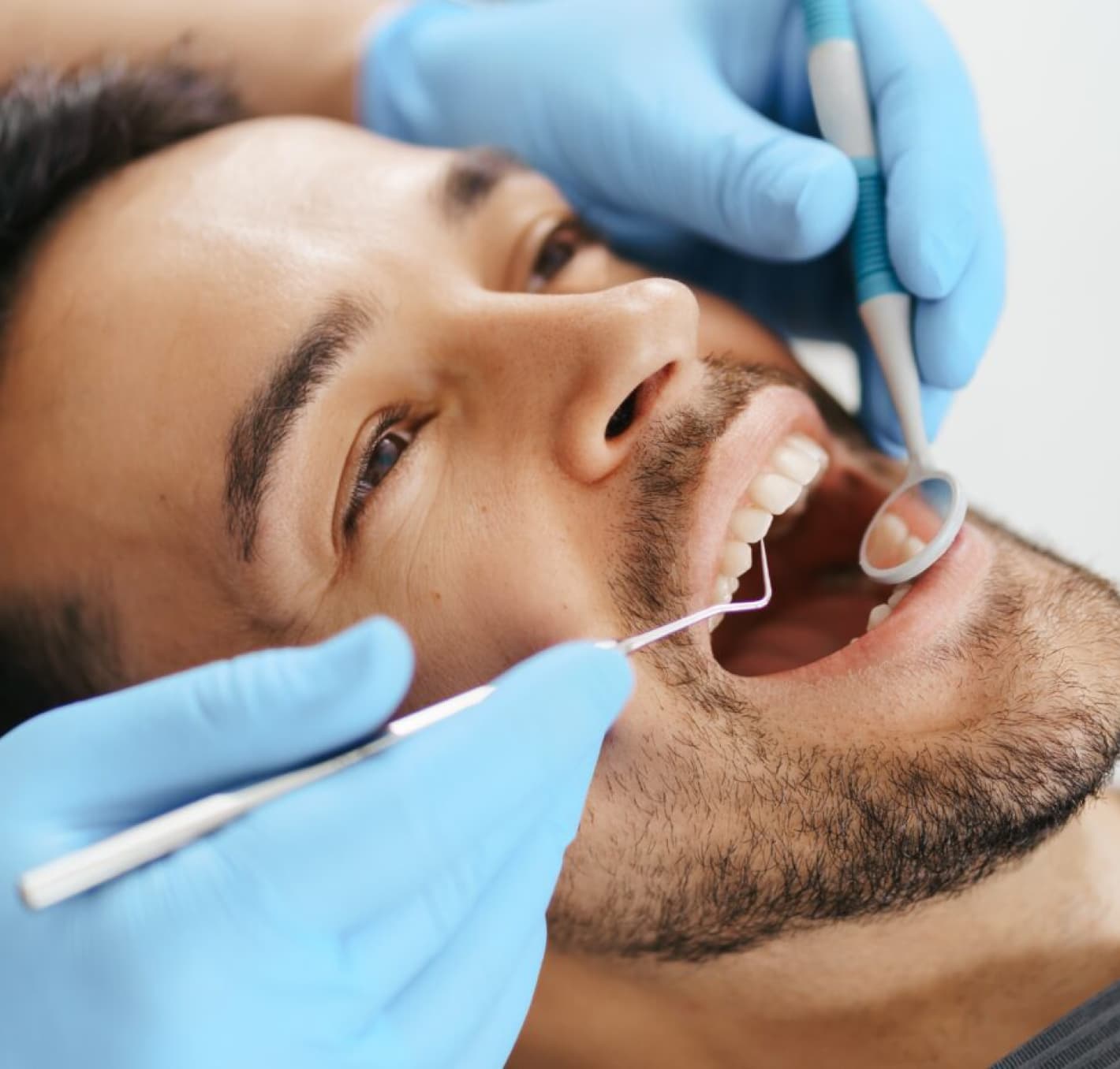 A patient receiving a dental cleaning